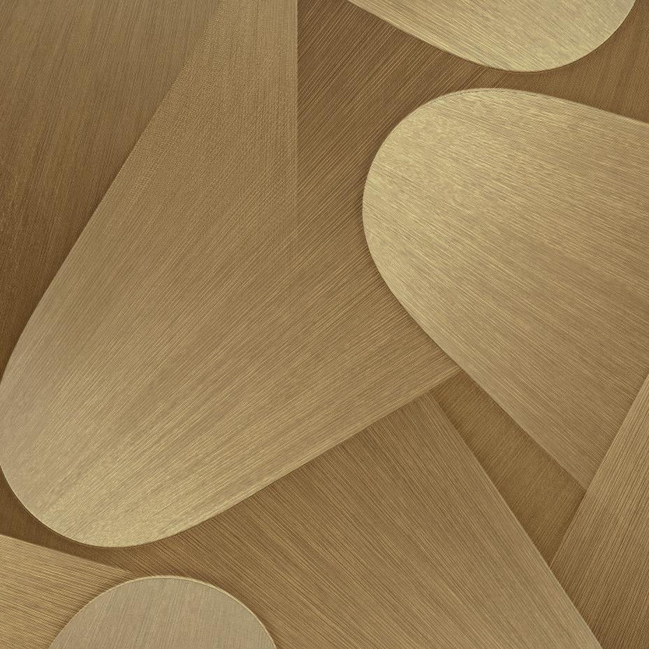 Close-up of a metallic wallpaper with abstract oval shapes.