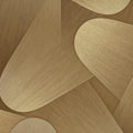 Close-up of a metallic wallpaper with abstract oval shapes.