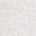 White floral pattern on a textured white background