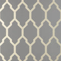 Closeup of a wallpaper showing its Contemporary, Geometric, Metallic, Trellis, Two-tone pattern, color, and subtle texture.