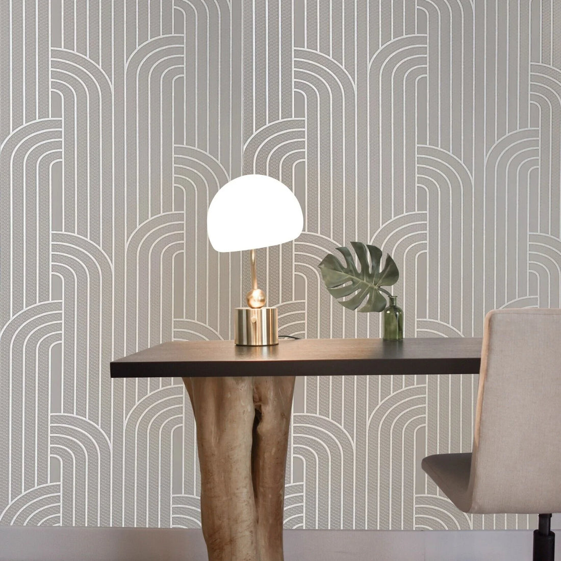 Patterned wallpaper with wavy lines on a gray background