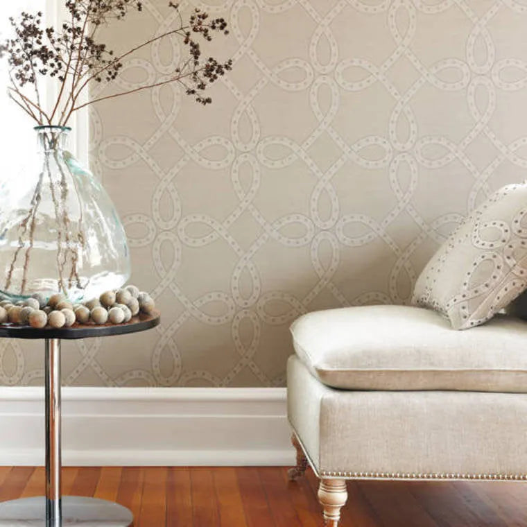 Closeup of a wallpaper showing its Art-Deco, Damask, Neutrals, Two-tone pattern, color, and subtle texture.