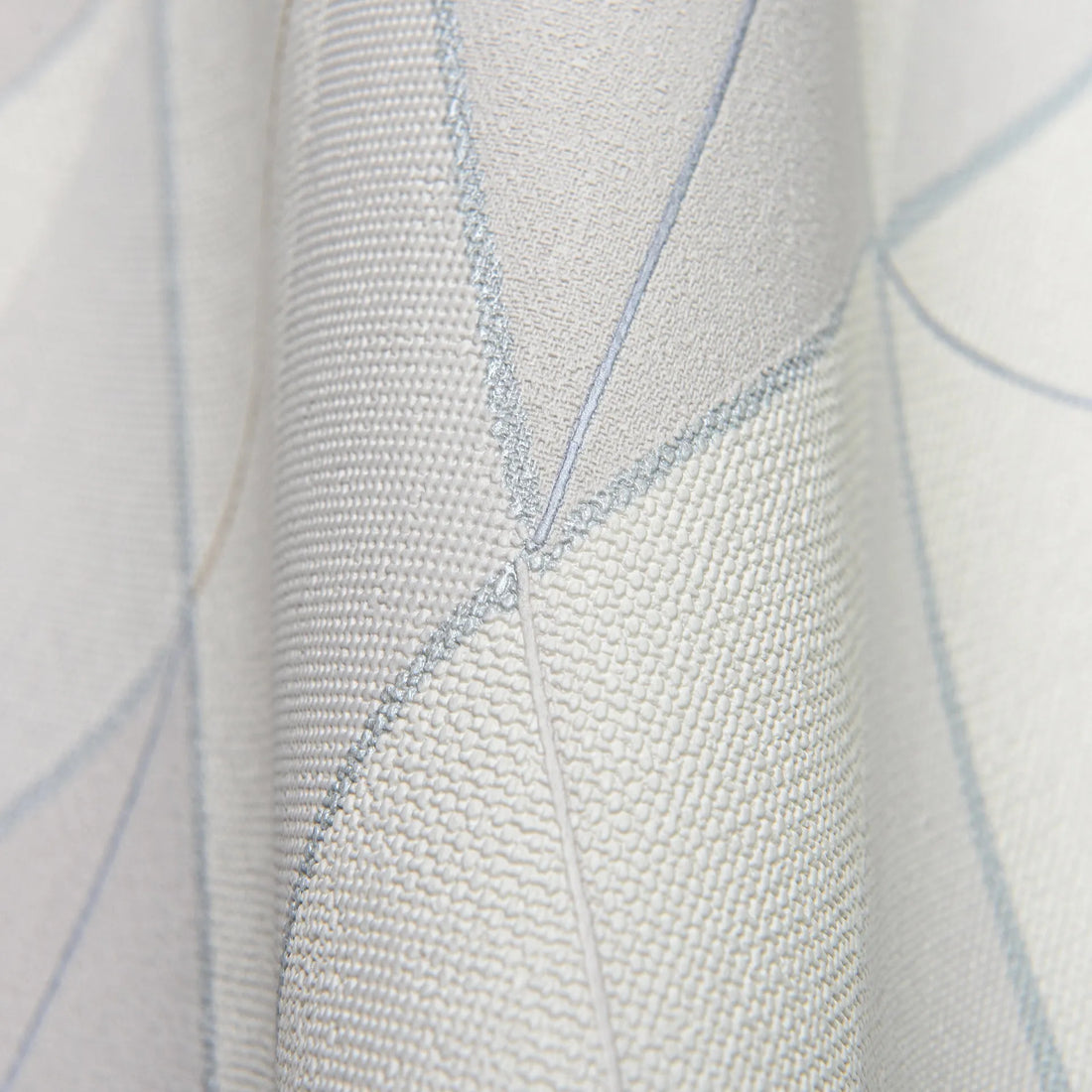 Closeup of a wallpaper showing its Contemporary, Geometric, Multicolour, Neutrals, Two-tone pattern, color, and subtle texture.