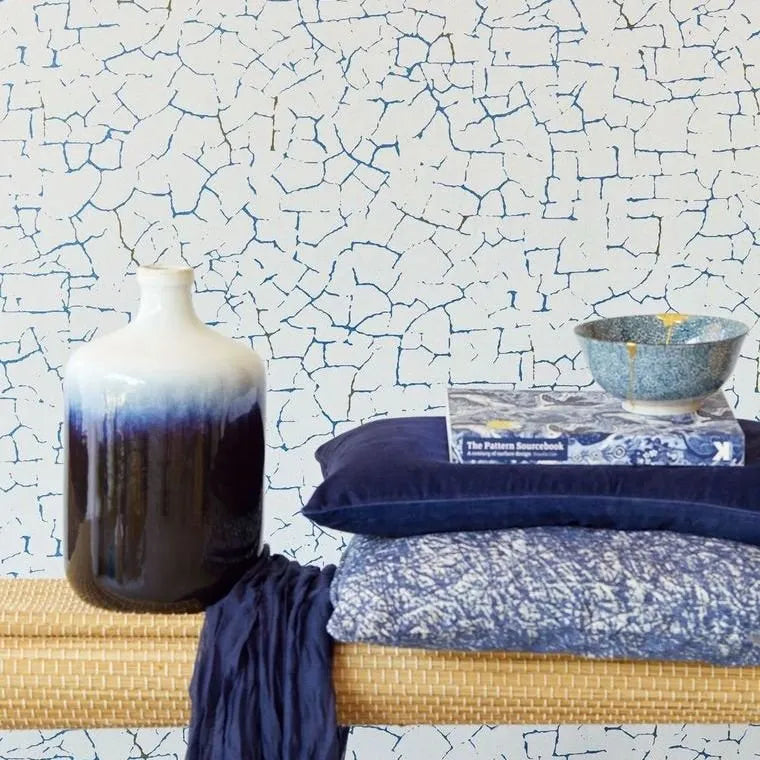 Closeup of a wallpaper showing its Abstract, Art-Deco, Contemporary, Two-tone pattern, color, and subtle texture.