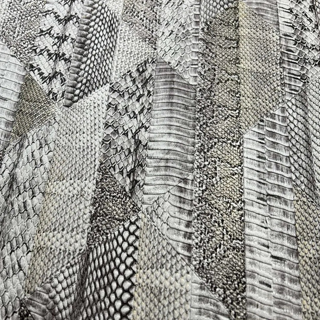 Wallpaper installed in a room showing its full pattern, color