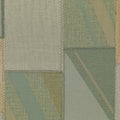 Patterned fabric swatch with green and beige tones