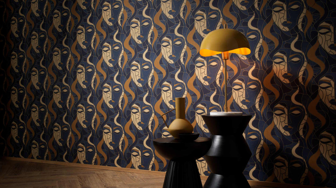Erismann Elle Decoration abstract face wallpaper in navy blue and gold tones with Art Deco design