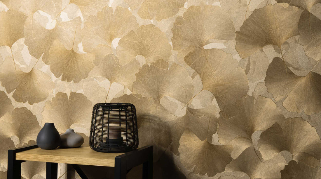 Erismann Elysium botanical wallpaper featuring delicate ginkgo leaves in soft white and light gray tones, creating a subtle, elegant and airy pattern with a refined minimalist feel.