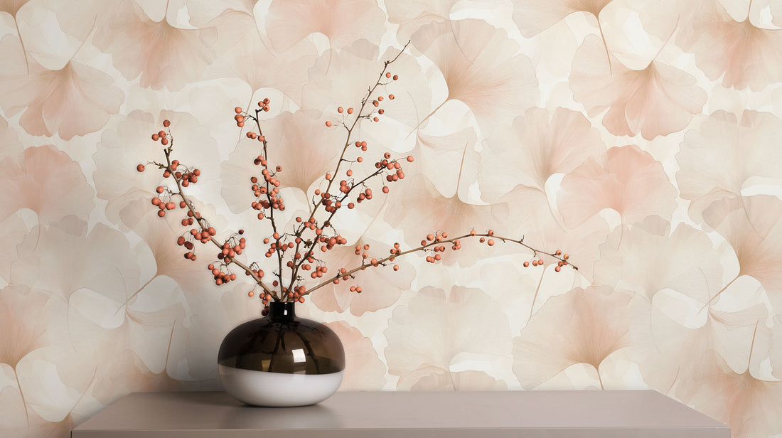 Erismann Elysium botanical wallpaper featuring delicate ginkgo leaves in soft pink and beige tones on a light background, creating a calm and elegant nature-inspired design.
