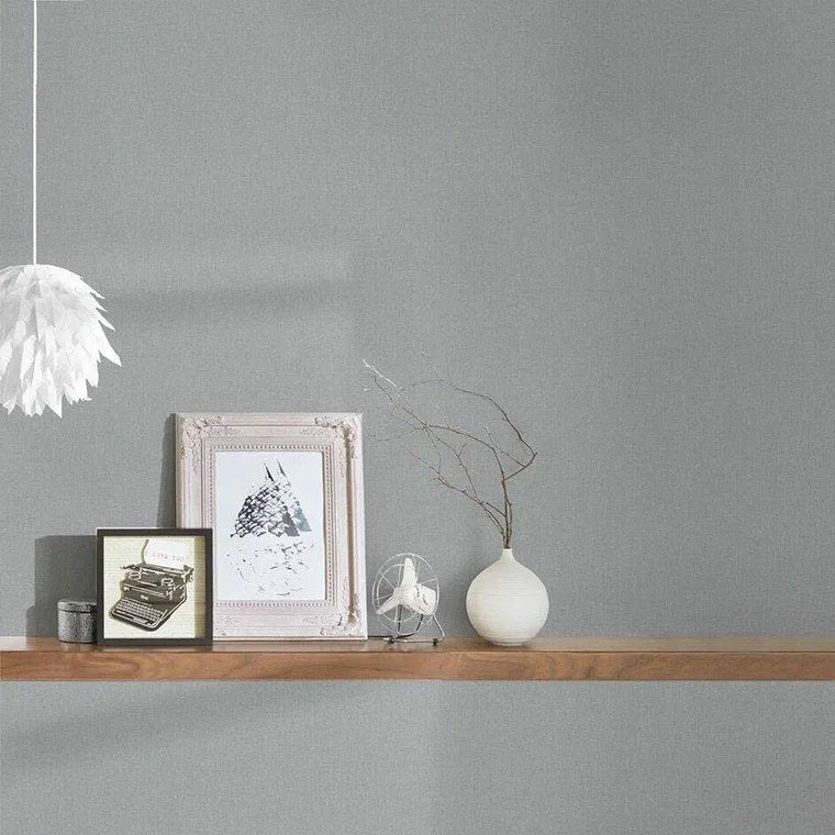 Closeup of a wallpaper showing its Contemporary, Monochrome, Plain, White pattern, color, and subtle texture.