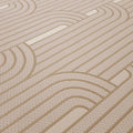 Close-up of a textured beige wallpaper with wavy lines